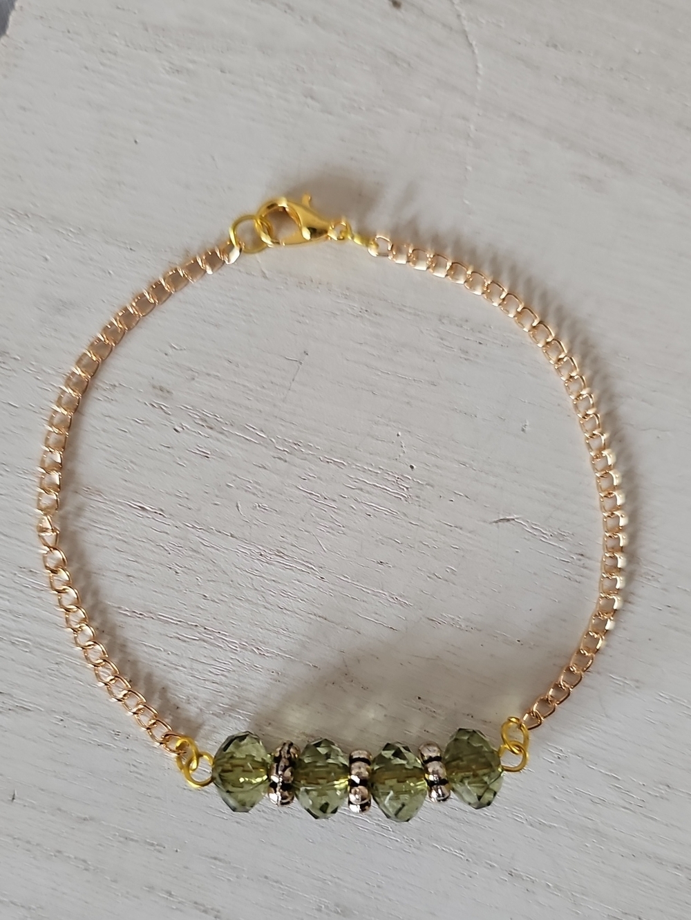 Gold-Tone Bracelet with Olive Green Faceted Beads